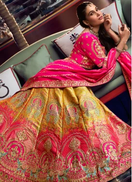 Banarasi Silk Designer Lehenga Choli with Embroidered Work in Mustard and Rose Pink for Bridal