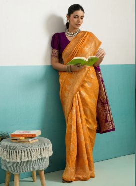 Silk Blend Traditional Saree in Orange and Purple with Woven Work for Casual