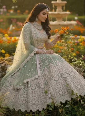 Net Designer Lehenga Choli with Embroidered Work in Sea Green
