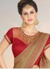 Sophisticated Beige and Brown Cutdana Work Faux Chiffon Traditional Designer Saree - 1