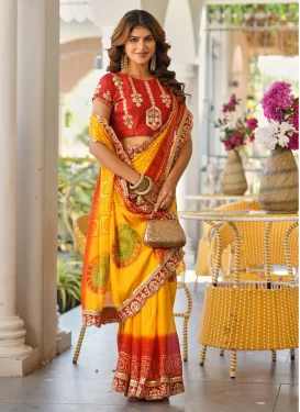 Chiffon Traditional Saree with Bandhani Print Work for Ceremonial in Red and Yellow