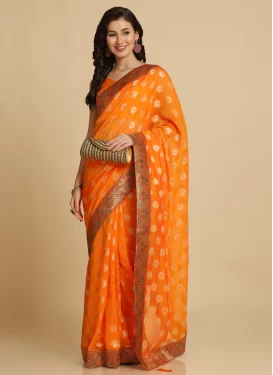 Lace Work Brasso Trendy Saree in Orange for Women