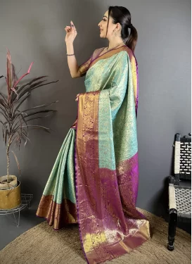 Kanjivaram Silk Trendy Saree with Woven Work for Ceremonial in Purple and Turquoise