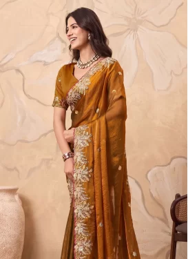 Chiffon Satin Classic Saree in Orange with Embroidered Work for Festival