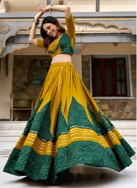Rayon Readymade Lehenga Choli with Bandhani Print Work for Ceremonial in Green and Mustard