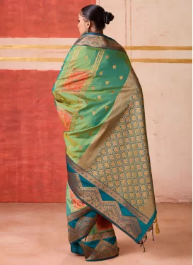 Handloom Silk Trendy Saree with Woven Work for Party in Green and Teal