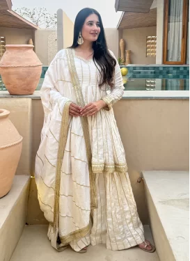 Vichitra Silk Palazzo Suit in Off White with Embroidered Work for Festival