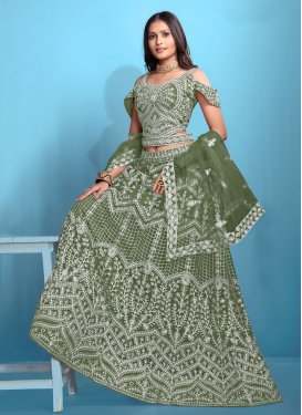 Net Trendy Lehenga Choli with Embroidered Work for Ceremonial in Green Net Trendy Lehenga Choli with Embroidered Work for Ceremonial in Green
