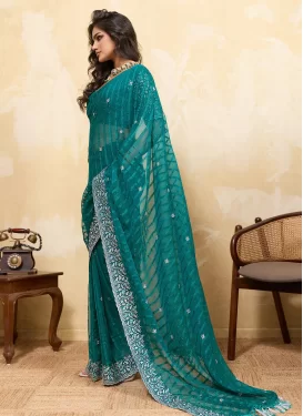 Chiffon Trendy Saree with Embroidered Work in Teal