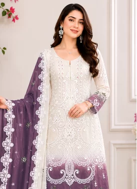 Georgette Pakistani Suit with Embroidered Work in Off White and Violet