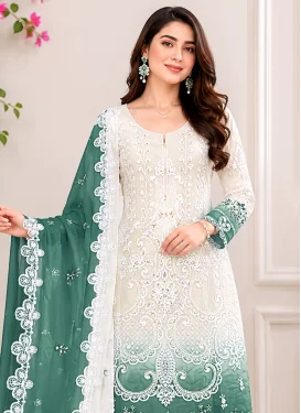 Georgette Pakistani Suit with Embroidered Work for Ceremonial in Off White and Sea Green