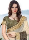 Staggering Cream and Olive Lycra Traditional Designer Saree - 1