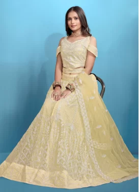 Net Designer Lehenga Choli with Embroidered Work in Cream Net Designer Lehenga Choli with Embroidered Work in Cream