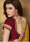 Magnetic Faux Georgette Bandhej Print Work Maroon and Mustard Traditional Saree - 1