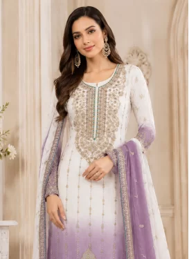 Crunchy Silk Pakistani Suit with Embroidered Work in Off White and Violet for Ceremonial