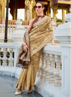 Tissue Trendy Saree with Woven Work in Beige and Brown