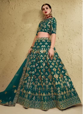 Art Silk Designer Lehenga Choli with Embroidered Work for Festival in Bottle Green