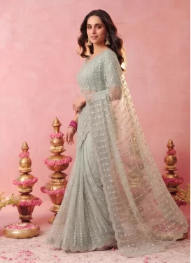 Net Traditional Saree in Turquoise with Embroidered Work for Ceremonial