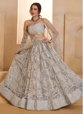 Net Designer Lehenga Choli with Cutdana Work in Grey for Party