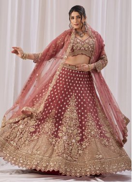 Net Trendy Lehenga Choli with Embroidered Work for Bridal in Salmon
