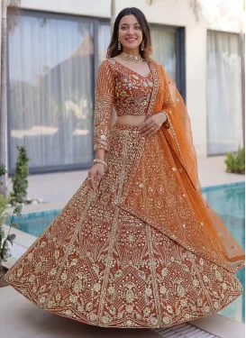 Embroidered Work Net Trendy Lehenga Choli in Orange for Women