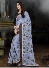 Brasso Georgette Black and Light Blue Trendy Saree For Ceremonial - 1