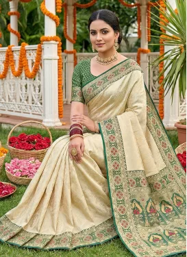 Jacquard Silk Trendy Saree with Woven Work for Festival in Cream and Green