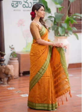 Woven Work Silk Blend Trendy Saree in Orange for Women