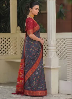 Silk Blend Traditional Saree in Black and Red with Woven Work for Women