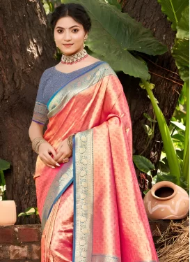 Kanjivaram Silk Trendy Saree with Woven Work for Party in Salmon
