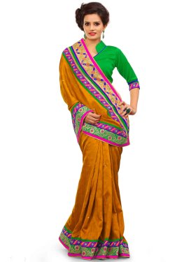 Angelic Mustard Color Lace Work Party Wear Saree