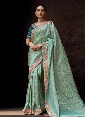 Aqua Blue Viscose Trendy Saree with Embroidered Work for Festival