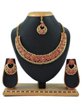 Arresting Gold Rodium Polish Stone Work Alloy Gold and Red Necklace Set For Festival