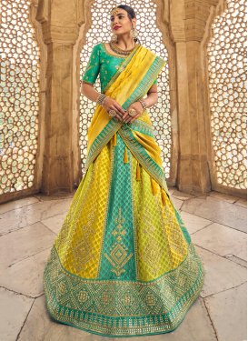 Banarasi Silk Turquoise and Yellow Designer Classic Lehenga Choli