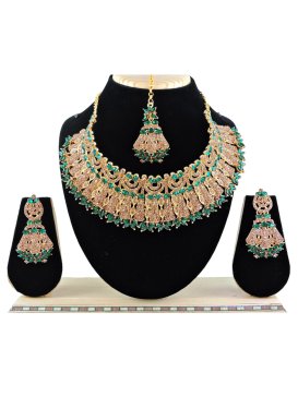 Beautiful Gold Rodium Polish Stone Work Alloy Gold and Teal Necklace Set For Ceremonial