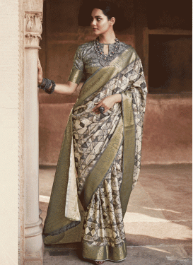 https://d3nsby4zkkv8rx.cloudfront.net/image/cache/data/beige-and-grey-geometric-print-work-designer-contemporary-saree-146447-273x375.gif