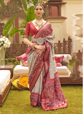 Beige and Red Trendy Classic Saree