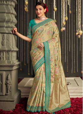 Beige and Teal Kajal Aggarwal Fancy Fabric Contemporary Style Saree