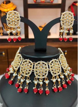 Blissful Gold Rodium Polish Moti Work Alloy Off White and Red Necklace Set