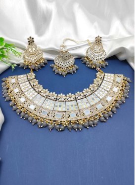 Catchy Gold Rodium Polish Mirror Work Grey and White Necklace Set for Ceremonial