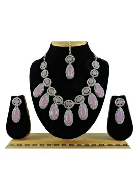 Catchy Silver Rodium Polish Stone Work Necklace Set For Ceremonial