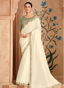 Chiffon Satin Traditional Saree in Cream with Embroidered Work for Festival