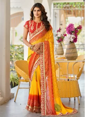 Chiffon Traditional Saree with Bandhani Print Work for Ceremonial in Red and Yellow