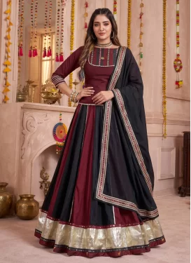 Chinon Readymade Lehenga Choli in Black and Red with Gota Patti Work for Festival