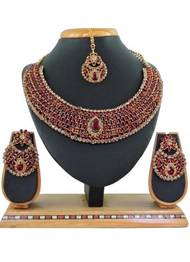 Dignified Alloy Gold and Maroon Necklace Set