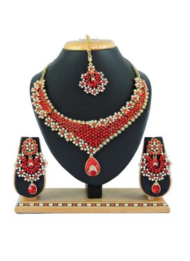 Dignified Gold Rodium Polish Stone Work Alloy Red and White Necklace Set For Festival