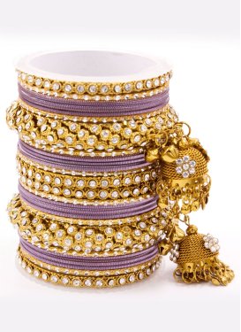 Dignified Stone Work Gold and Violet Alloy Bangles