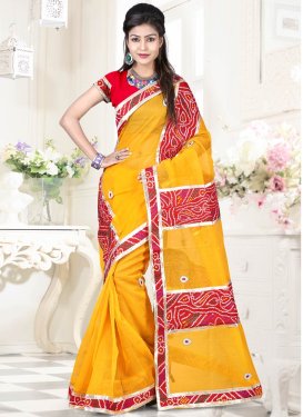 Distinctively Yellow Color Net Casual Saree