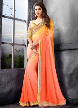 Energetic Coral Color Faux Georgette Party Wear Saree