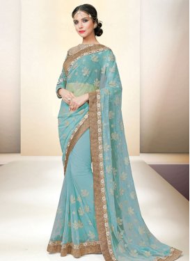 Energetic Lace Work Net Light Blue Trendy Classic Saree For Festival
